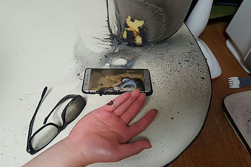 (FILES) This file handout photo taken and released by Gwangju Bukbu Police Station on September 13, 2016 shows a blown-up Samsung Galaxy Note7 smartphone in Gwangju, 270 kms south of Seoul. Exploding batteries, an embarrassing recall of a flagship gadget, a controversial, closely-watched leadership transition -- it's been a bad year for Samsung, and analysts are warning it could get worse.  / AFP PHOTO / Gwangju Bukbu Police Station / STR / TO GO WITH SKorea-Samsung-telecommunication-recall-Lee by Jung Ha-Won  ---- EDITORS NOTE ---- RESTRICTED TO EDITORIAL USE   MANDATORY CREDIT "AFP PHOTO / GWANGJU BUKBU POLICE STATION"   NO MARKETING NO ADVERTISING CAMPAIGNS  -  DISTRIBUTED AS A SERVICE TO CLIENTS /